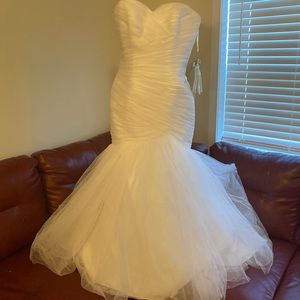 Never worn wedding dress